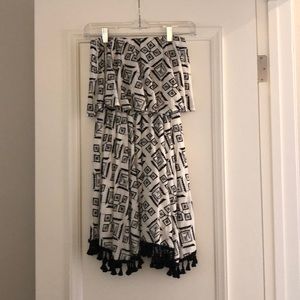 Sleeveless dress with tassels